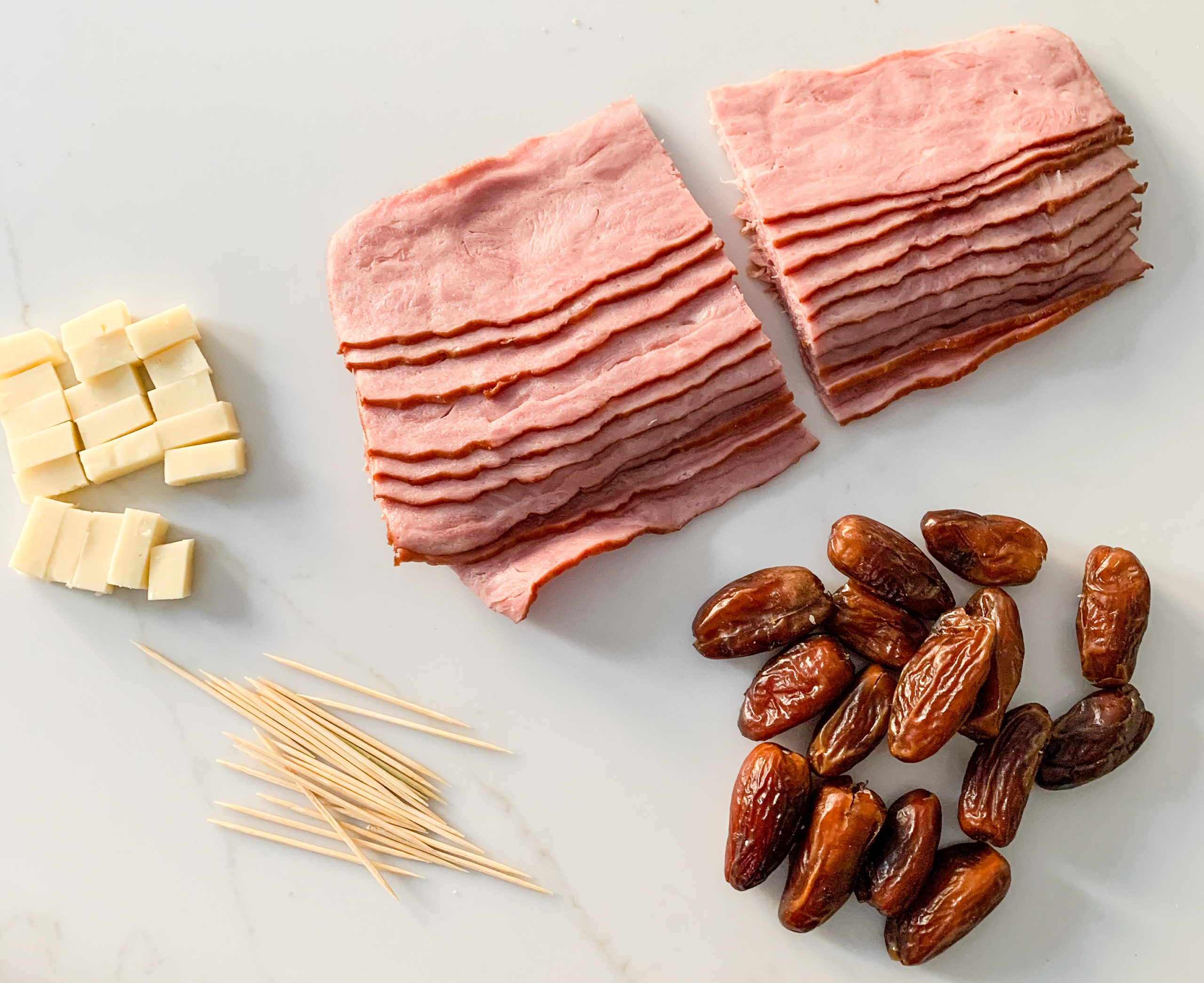 Turkey Bacon Wrapped Dates with Manchego - Photo